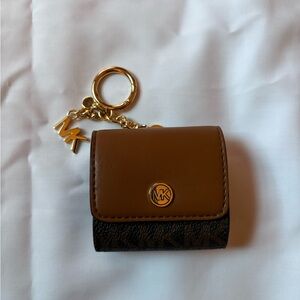 Michael Kors Brown and Gold AirPod Case.